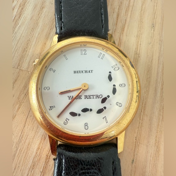 Rare Beuchat counter clockwise gold tone black leather watch NEW BATTERY